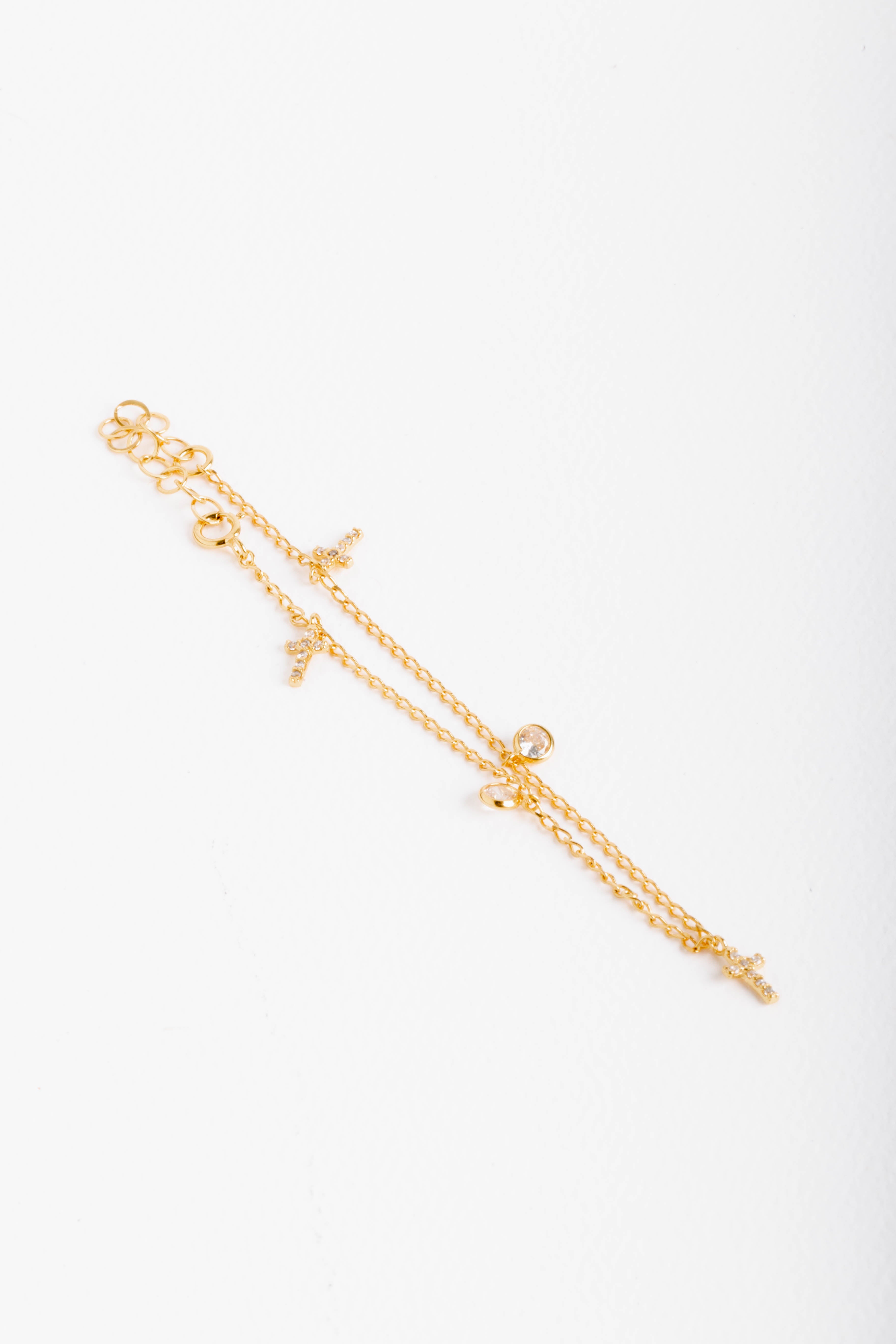 Pulsera de plata .925 bañada en oro 18K Mini cruz