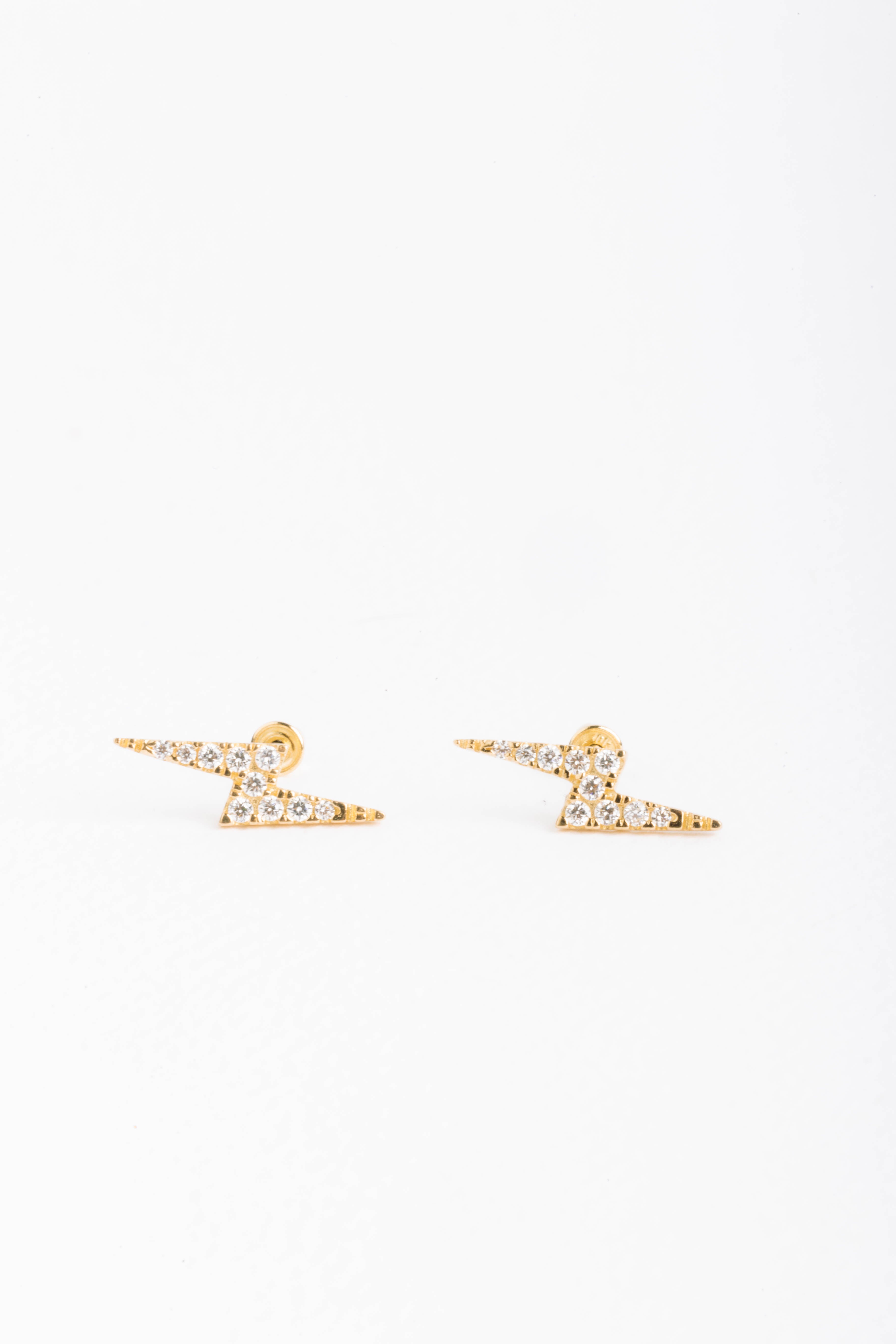 Broquel de oro sólido 10K Rayo con zirconia 1 cm x 0.4 cm