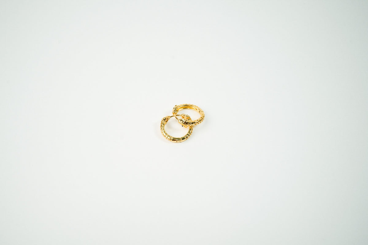 Aretes acero inoxidable WATERPROOF dorados jaguar