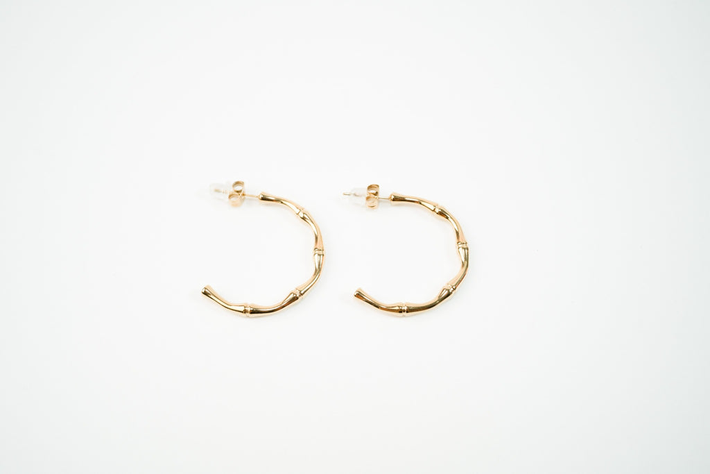 Aretes media arracada acero inoxidable WATERPROOF dorados huesitos