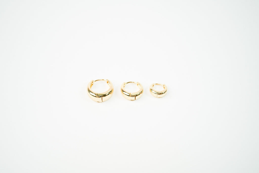 Arracadas baño de oro doradas set de tres pieza huggies