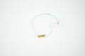 Pulsera hilo azul cielo con pez de baño de oro
