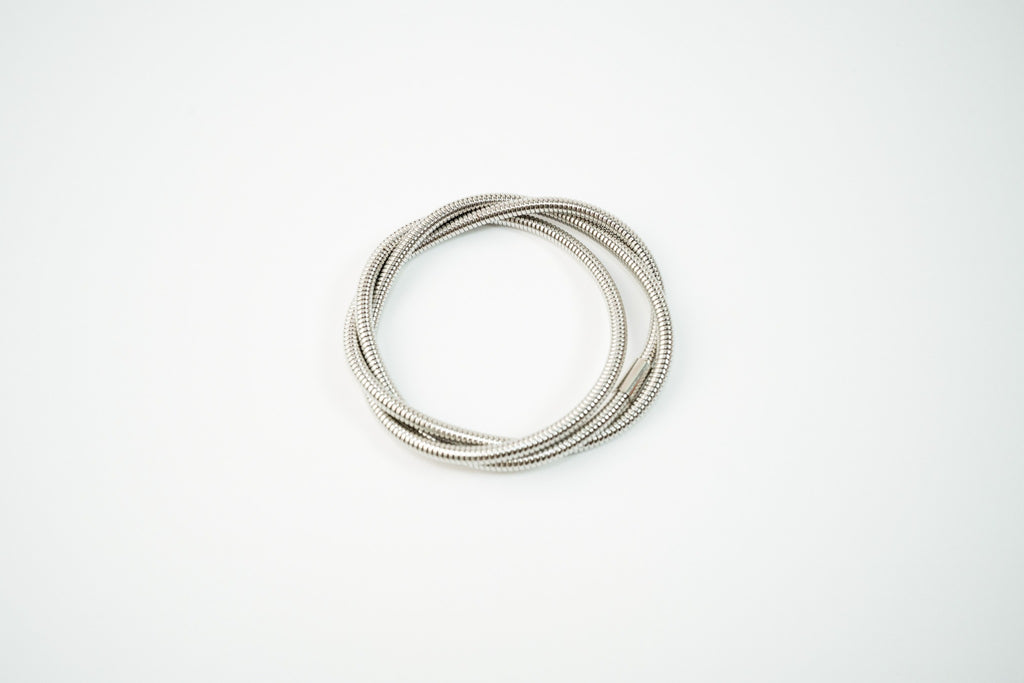 Pulsera acero inoxidable WATERPROOF de resorte enredada triple plateada