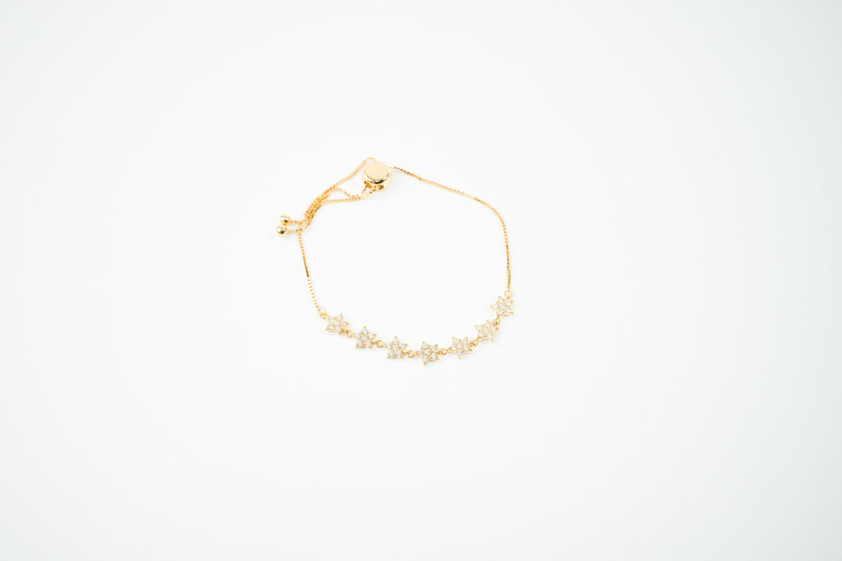Pulsera de plata .925 bañada en oro 18k  ajustable estrella con zirconia dorada
