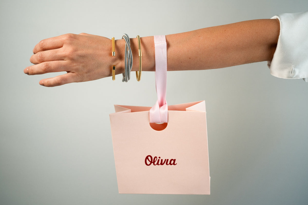 Pulsera acero inoxidable WATERPROOF de resorte enredada triple plateada